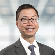Portrait of Justin Y.K.  Chu